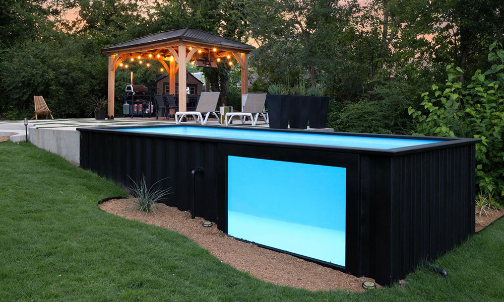 Ecopool container swimming pool at sunset