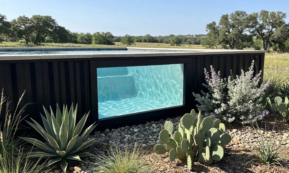 Container pool with window installed in Texas backyard