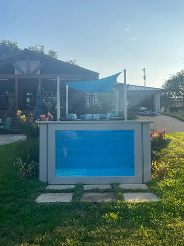 Relaxing poolside at an Ecopool container pool
