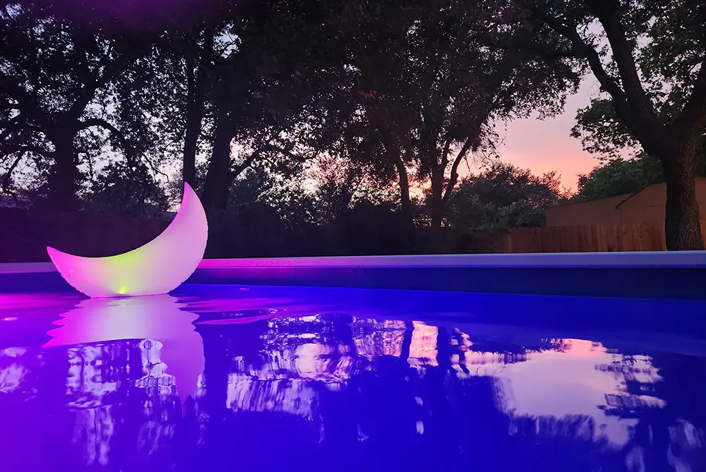 Golden sunset reflecting off an Ecopool container pool