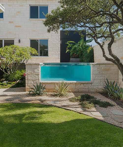 Custom limestone pool with window