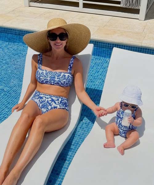 Mom and baby playing in the pool