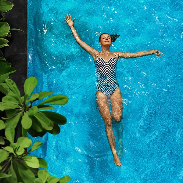 Lady Swimming in Ecopool