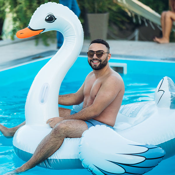 Happy Dude Swimming in Ecopool