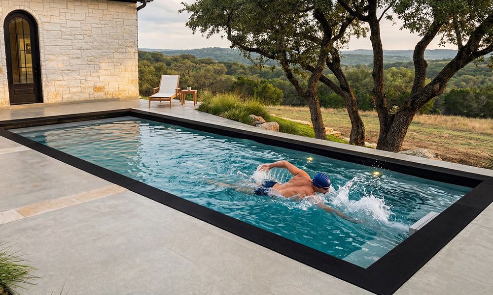 Swimmer training in Ecopool swim spa exercise pool