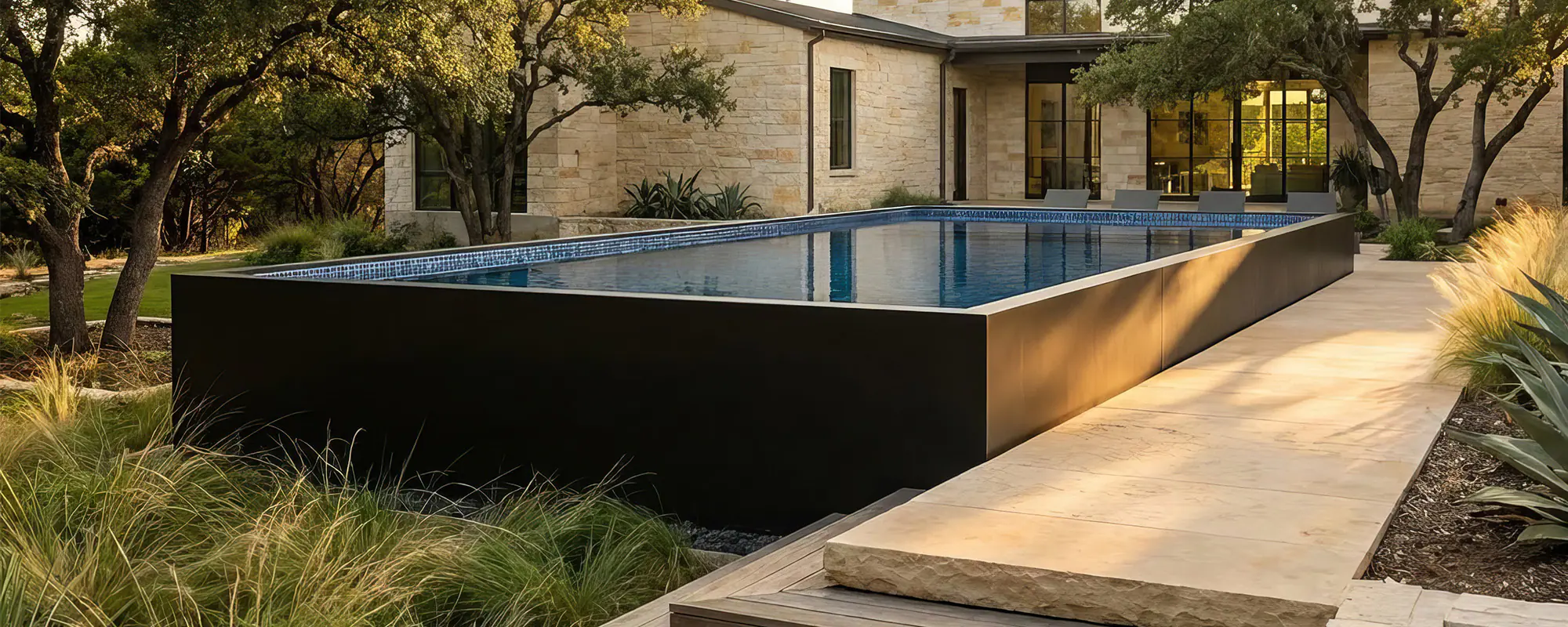 Modern architectural pool at sunset