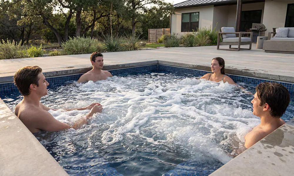 Fully inground Ecopool hot tub with flush deck