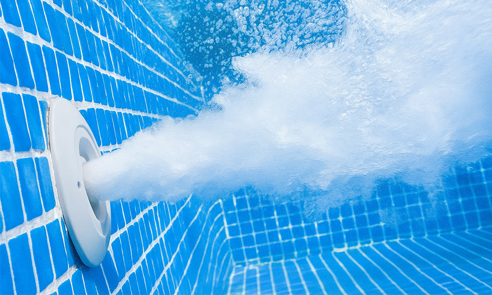 Close-up of powerful Ecopool swim jets in hot tub