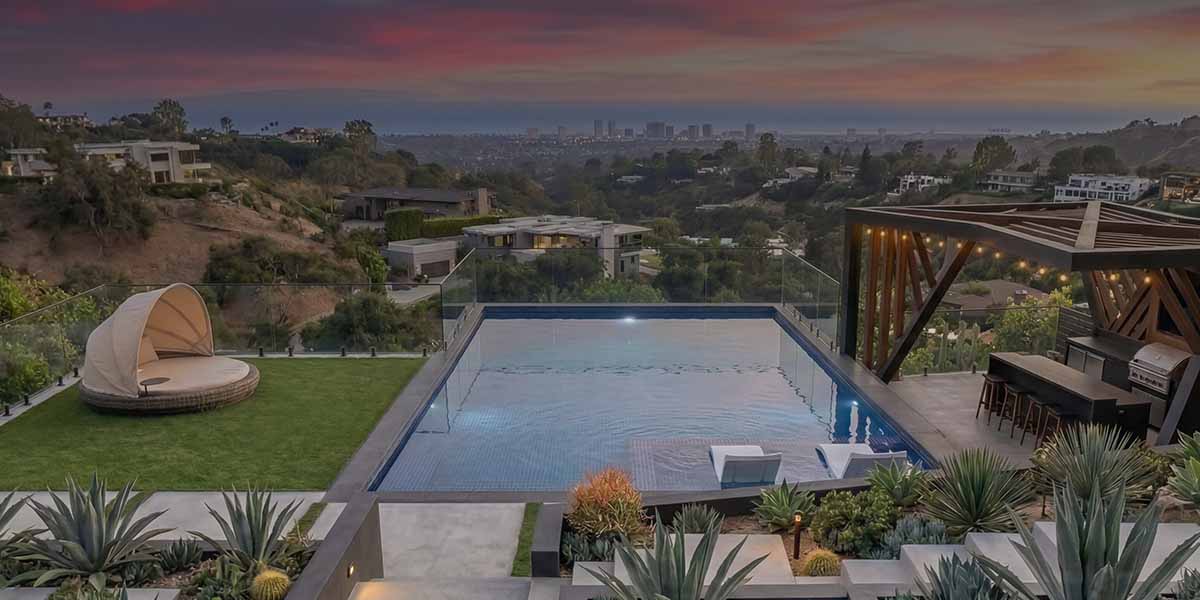 Modern inground Ecopool installation with clean coping and landscaping